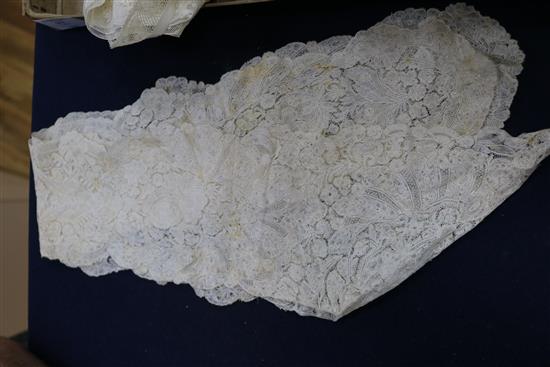 An early 18th century lace collar together with mixed needle and bobbin 19th century laces